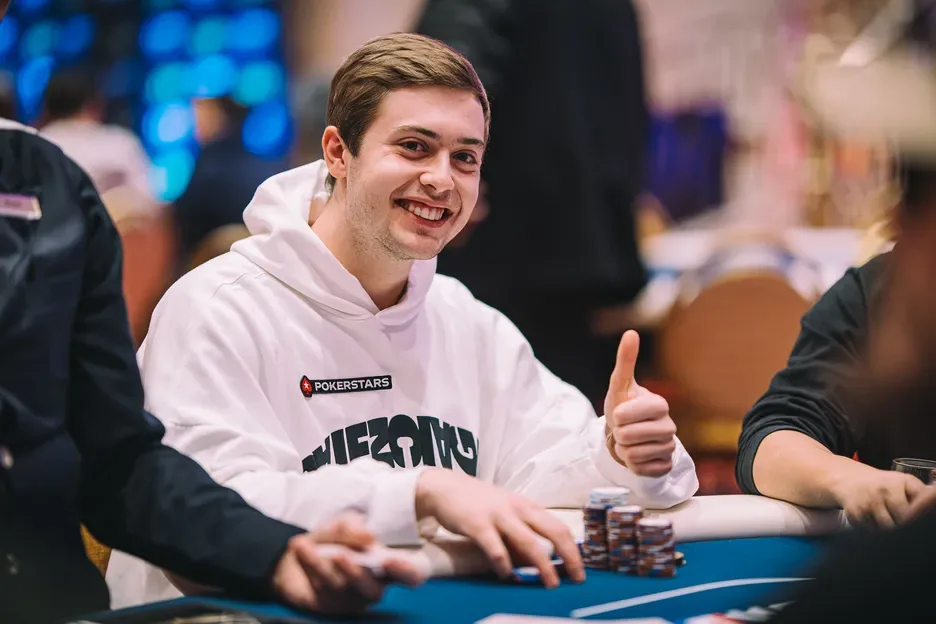 Frankie Cucchiara in a PokerStars-branded hoodie at the table during the NextGen Poker era