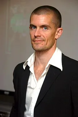 Gus Hansen Gus Hansen headshot