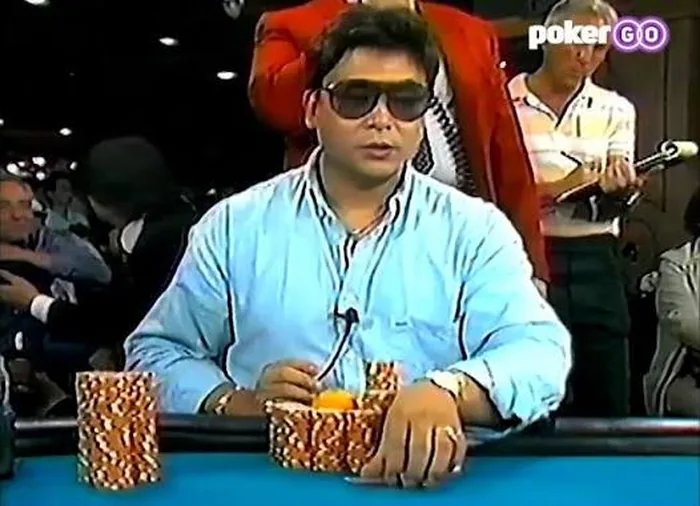 Johnny Chan 1980s WSOP Johnny Chan at a 1980s WSOP final table with his trademark orange on his chips