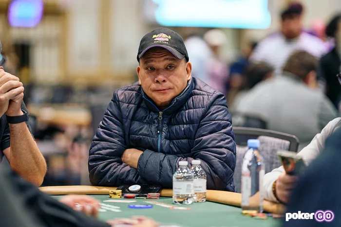 Johnny Chan reputation and legacy Johnny Chan seated at a WSOP table with his arms folded