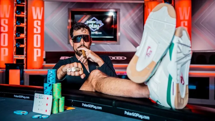 Nick Schulman PokerGO WSOP Nick Schulman on the PokerGO set at the WSOP with his feet on the table
