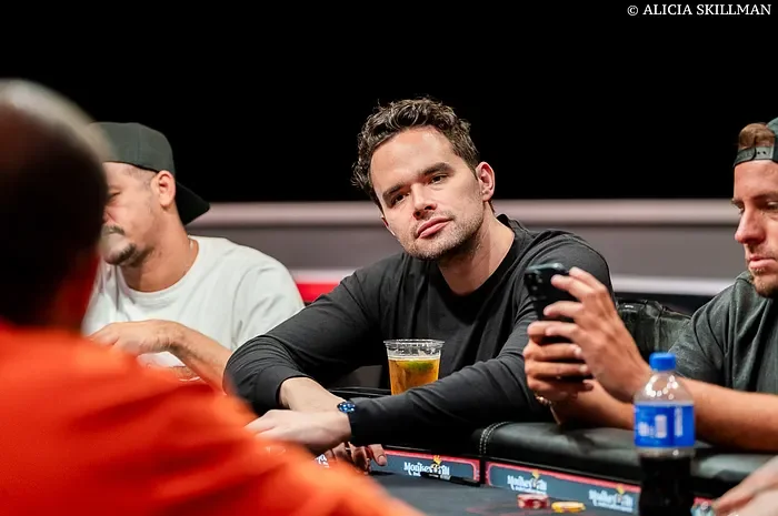 Alan Keating seated at a Hustler Casino Live cash game table