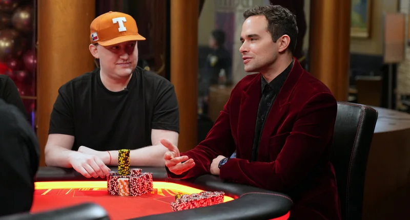 Alan Keating wearing a red velvet jacket on High Stakes Poker