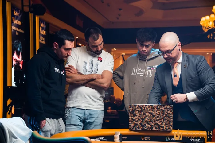 Players and tournament officials reviewing the three-way ICM deal at Triton SHRS Jeju 2026 Event 8