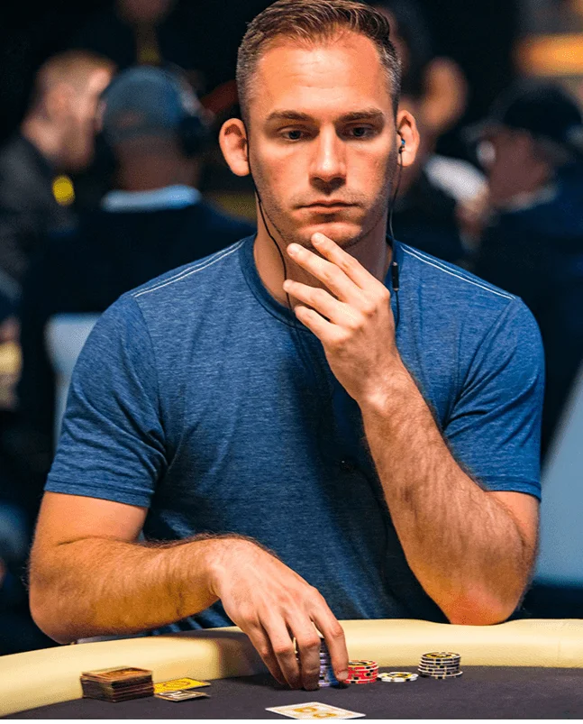 Justin Bonomo at the poker table during a high roller tournament