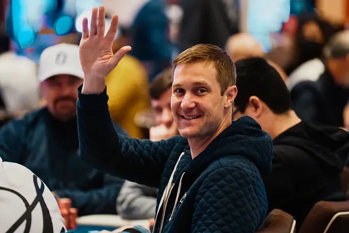 Brad Owen in a Las Vegas poker room Brad Owen waving from his seat in a busy poker room