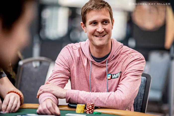 Brad Owen WPT ambassador Brad Owen smiling at the table in a WPT ambassador hoodie