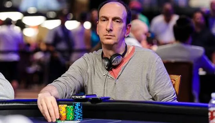 Erik Seidel WSOP table Erik Seidel at the WSOP with headphones around his neck