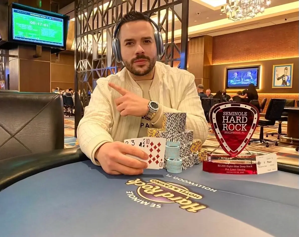Farid Jattin with the trophy after winning a $2,200 Pot Limit Omaha event at Seminole Hard Rock Hollywood