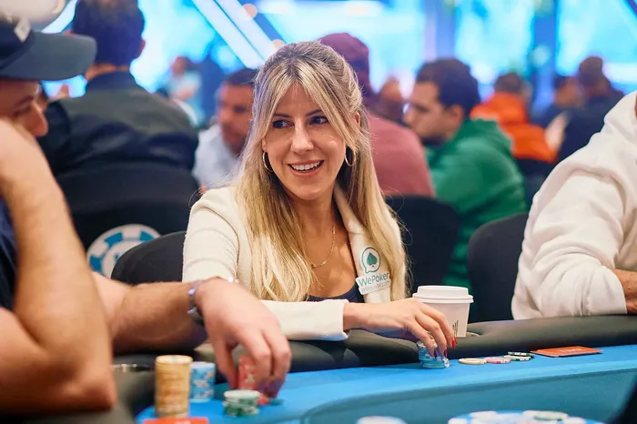 Kristen Foxen at a live poker tournament Kristen Foxen competing at a live poker tournament wearing a WePoker patch