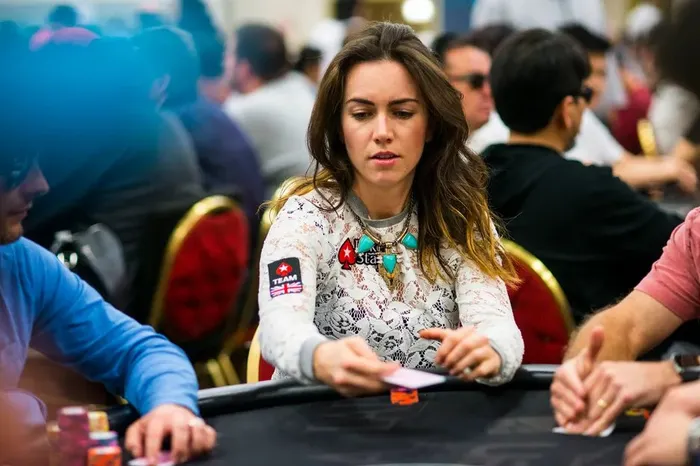 Liv Boeree at a poker tournament in PokerStars gear Liv Boeree competing at a poker tournament wearing Team PokerStars gear