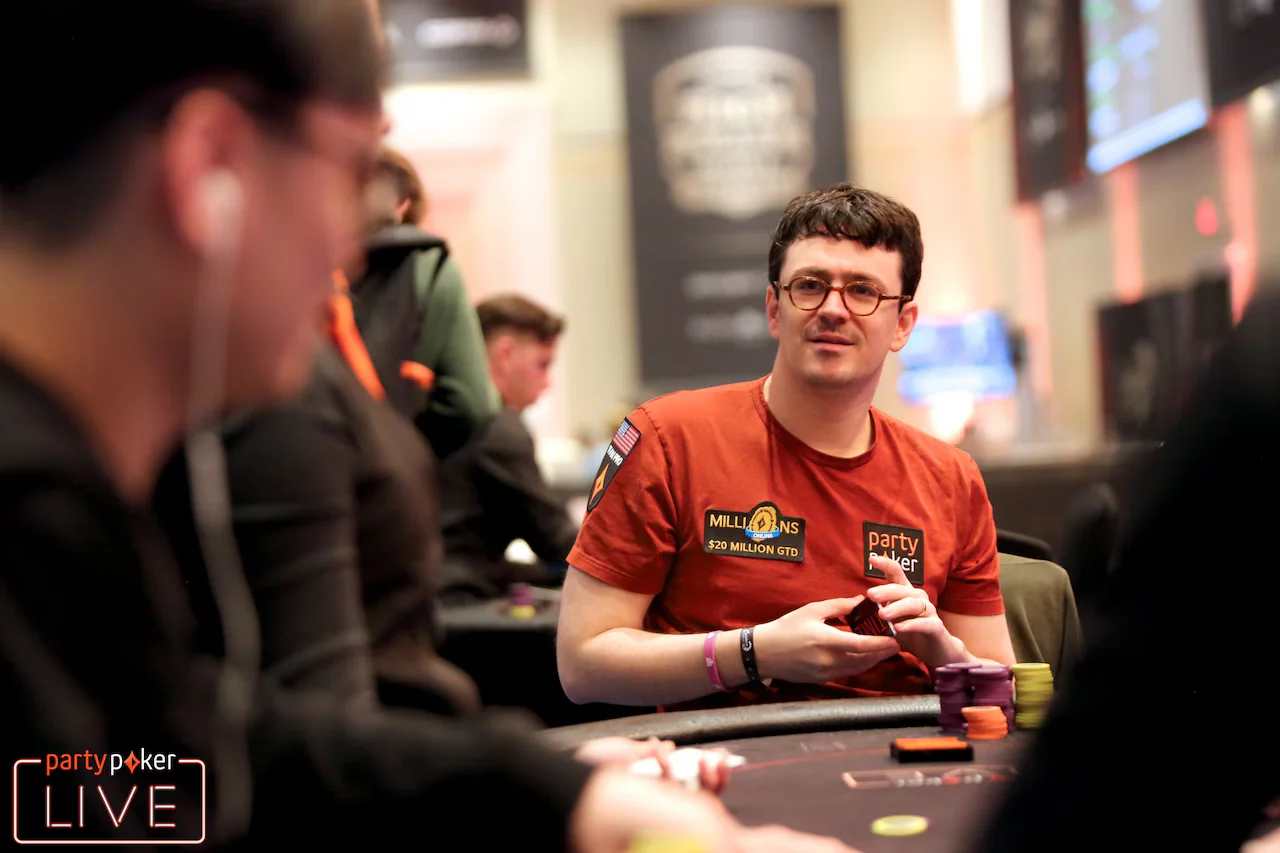 Isaac Haxton partypoker LIVE Isaac Haxton wearing a partypoker patch at a partypoker LIVE event