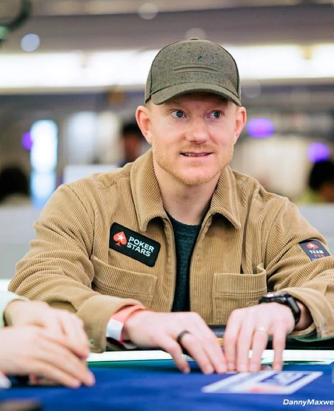 Jason Koon wearing PokerStars patch at a live poker tournament