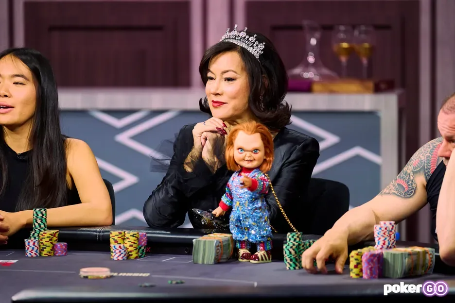 Jennifer Tilly wearing a tiara at a televised poker table
