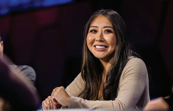 Maria Ho Tournament Poker Maria Ho smiling at the poker table during a live tournament