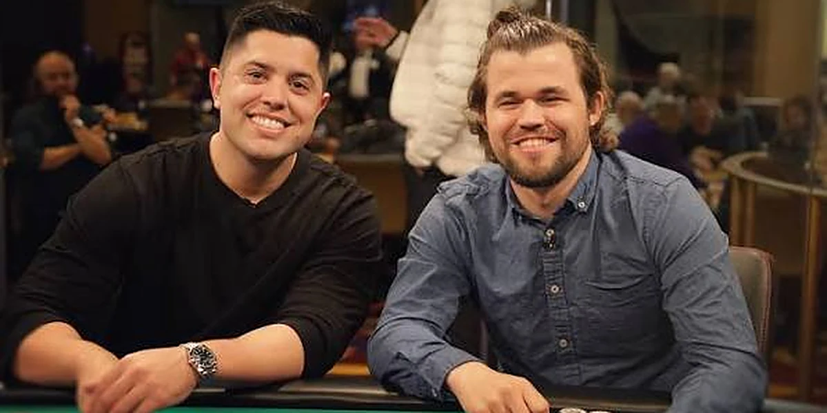 Mariano Grandoli with Magnus Carlsen Mariano Grandoli smiling at the poker table alongside chess champion Magnus Carlsen
