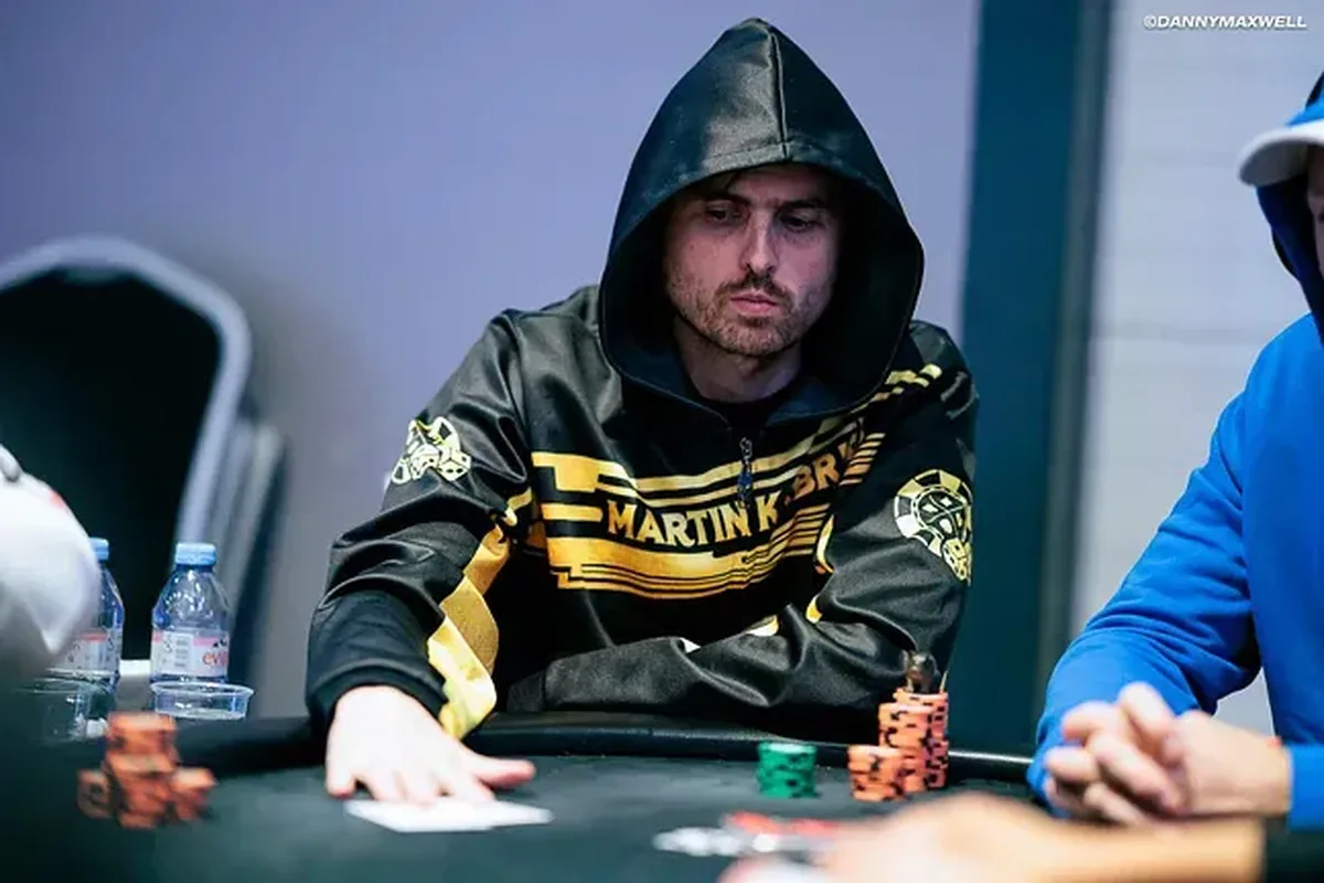 Martin Kabrhel wearing his custom hoodie at a poker tournament Martin Kabrhel in a custom Martin Kabrhel branded hoodie at a poker event
