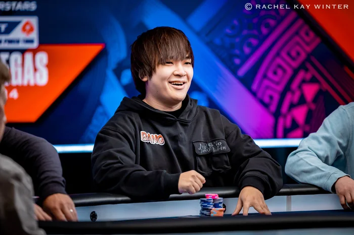 Masato Yokosawa smiling at an EPT poker tournament table in Las Vegas
