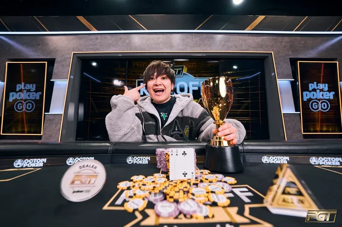 Masato Yokosawa celebrating his first PGT title at the 2025 Kickoff with trophy and chips