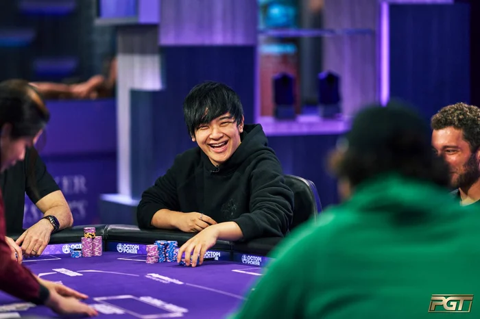 Masato Yokosawa laughing at a PokerGO Tour Poker Masters table