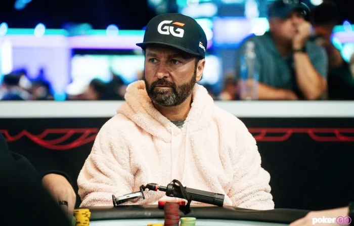Daniel Negreanu in a GGPoker cap and pink hoodie at a WPT event