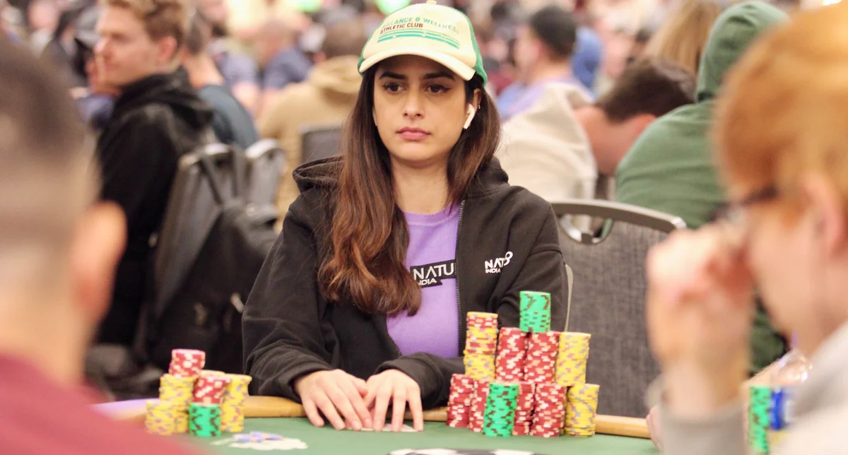 Nikita Luther WSOP Main Event Nikita Luther with a large chip stack at the WSOP Main Event wearing Natural8 India gear