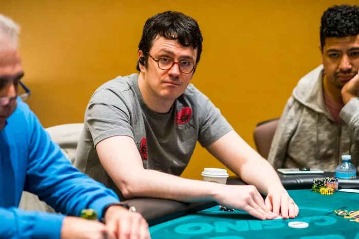 Elite online-to-live crossover player Isaac Haxton competing at a live poker event