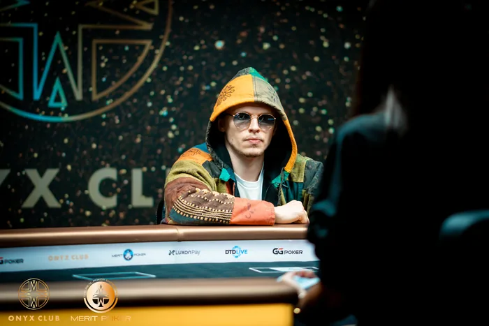 Ossi Ketola at the heads-up table, Onyx Club, North Cyprus Ossi Ketola in a patchwork hoodie and sunglasses at the heads-up table at Onyx Club, Merit Poker, North Cyprus