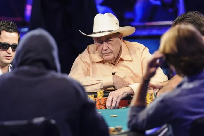 Doyle Brunson wearing his iconic cowboy hat at the World Series of Poker table