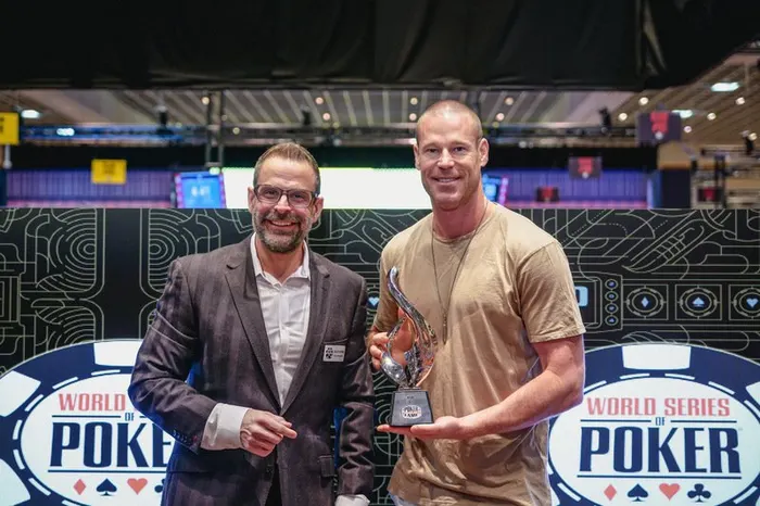 Patrik Antonius holding his Poker Hall of Fame trophy at the 2024 WSOP induction ceremony