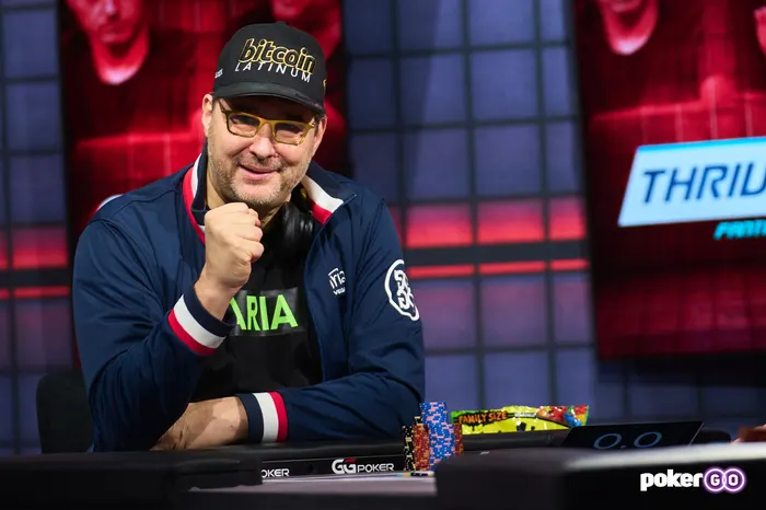 Phil Hellmuth fist-pumping in his signature style at a PokerGO televised poker event