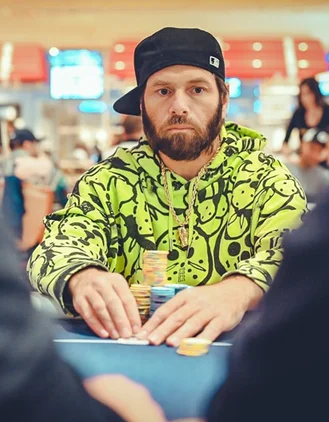 Rick Salomon Poker Player Profile Rick Salomon at a poker tournament wearing a neon green hoodie