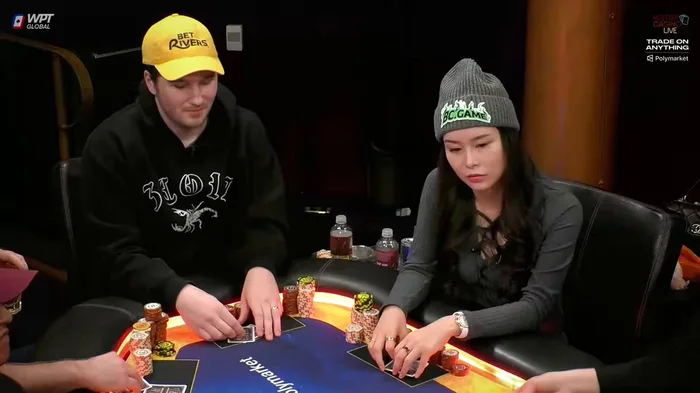 Sashimi wearing her BC.GAME sponsor beanie while playing a hand on Hustler Casino Live
