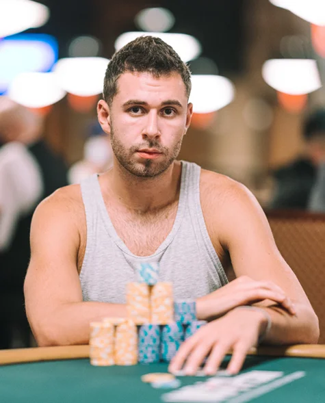 Sean Perry at the poker table with a stack of chips during a WSOP tournament