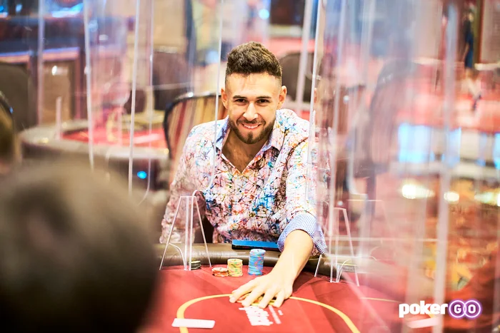 Sean Perry competing behind plexiglass dividers during a 2021 PokerGO high-roller event