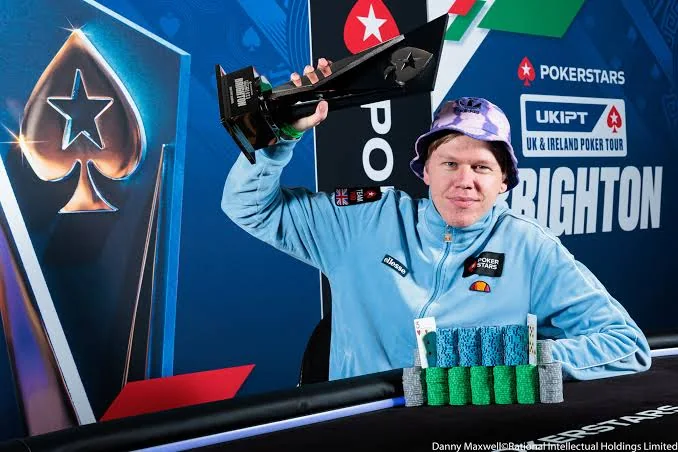 Spraggy Wins UKIPT Brighton Main Event Spraggy lifting the UKIPT Brighton Main Event trophy in 2023
