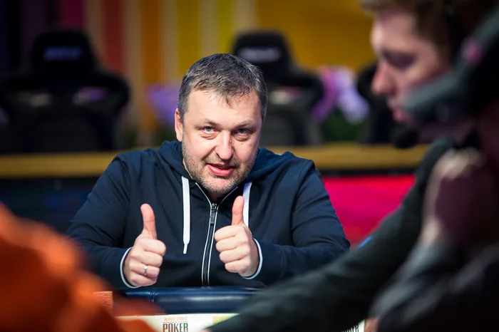 Tony G giving double thumbs up at a WSOP poker tournament table