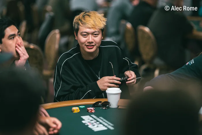 Wesley Fei WSOP Early Career Wesley Fei smiling at the WSOP poker table