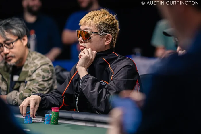 Wesley Fei Playing Style WSOP Wesley Fei wearing sunglasses at a WSOP poker tournament