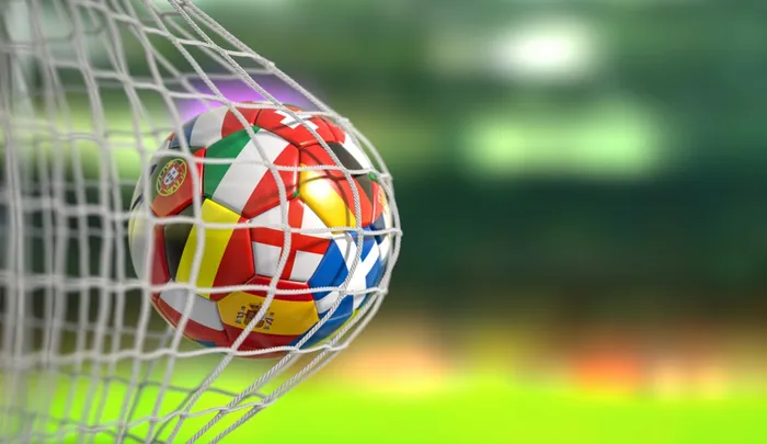 Football with national flags hitting the back of the net during World Cup 2026