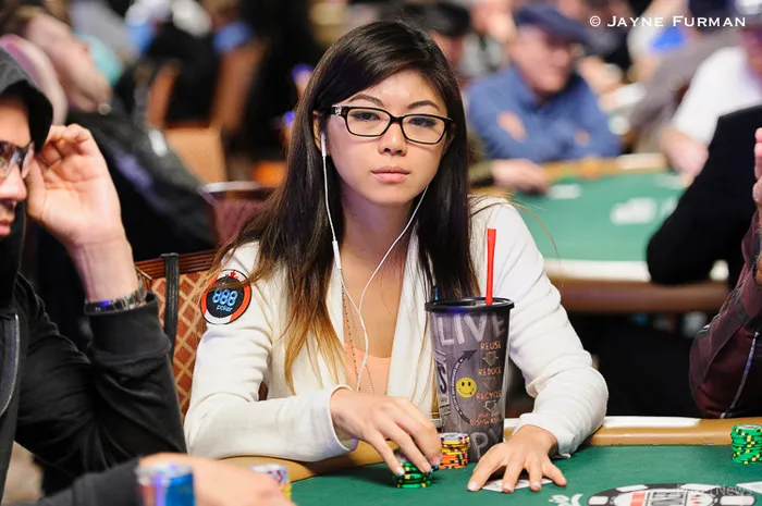 Xuan Liu playing at the WSOP wearing an 888poker patch