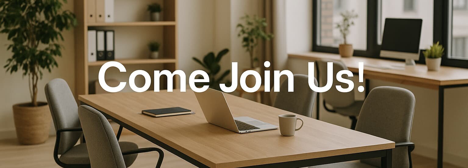 Come Join Us an office table with a laptop on it and multiple empty chairs