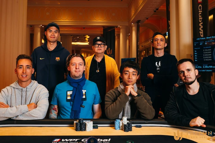 Event #18 final table players (clockwise from back-left): Kiat Lee, Richard Yong, Ruslan Khadartsev, Mikita Badziakouski, Michael Zhang, Martin Nielsen, Rene Van Krevelen Event #18 final table players (clockwise from back-left): Kiat Lee, Richard Yong, Ruslan Khadartsev, Mikita Badziakouski, Michael Zhang, Martin Nielsen, Rene Van Krevelen
