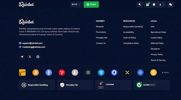 Rainbet website footer showing RBGAMING N.V. as operator, Anjouan company address, supported cryptocurrencies, and Provably Fair and Licensed badges