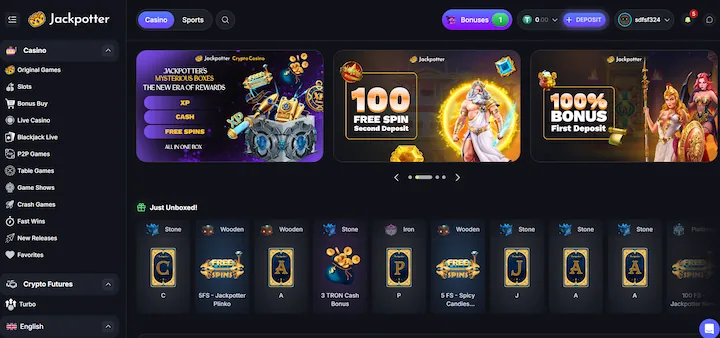 Interfejs kasyna kryptowalutowego Jackpotter z systemem Mysterious Boxes, bonusem 100 free spinów i sekcją Crypto Futures
