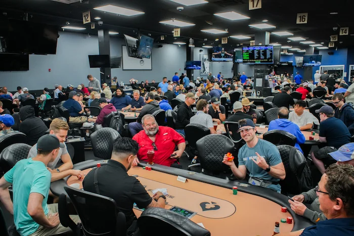 Lodge Card Club poker room interior showing a packed tournament during the Lodge Championship Series