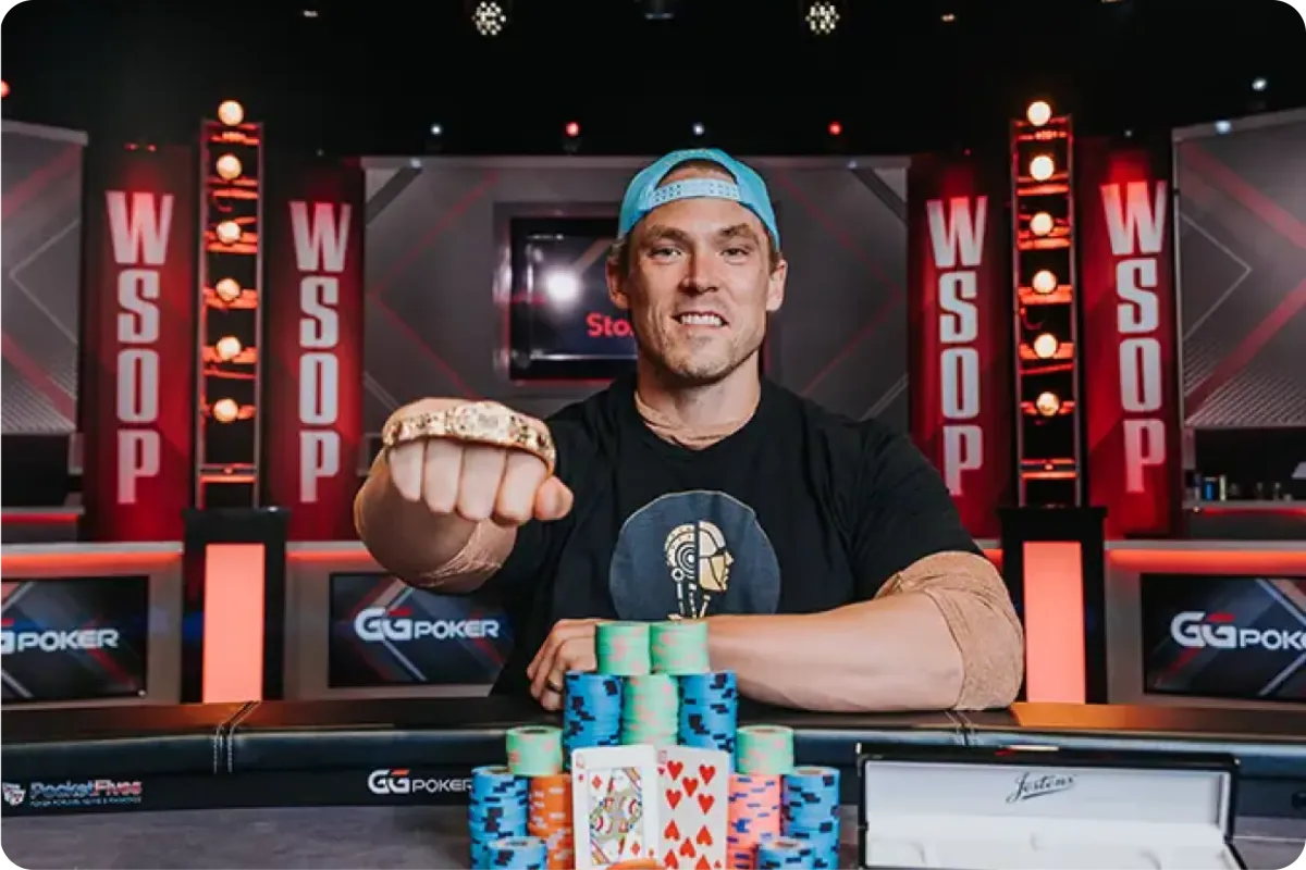 Alex Foxen shows off his WSOP bracelet after winning a poker tournament at the World Series of Poker