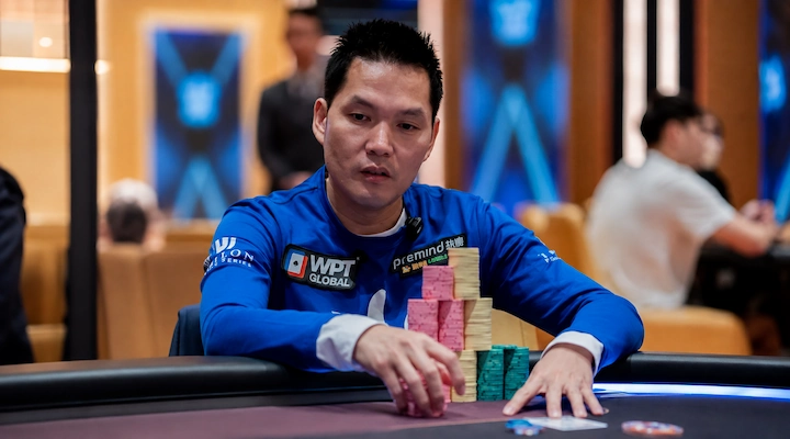 Ren Lin wearing a WPT Global patch at a live tournament table